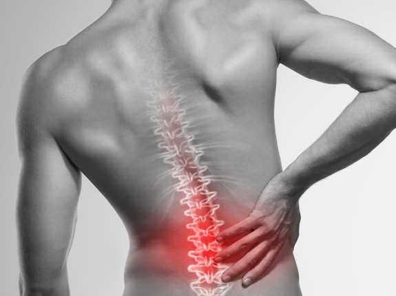 Ból w dole pleców, przyczyny i leczenie bólu w odcinku lędzwiowym